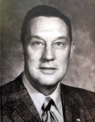 A black and white photo of a man